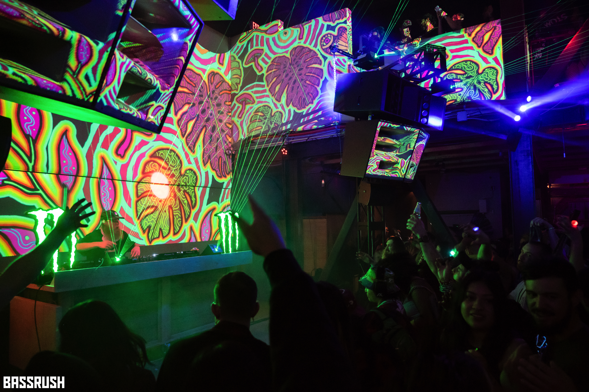 Psychedelic projections behind the DJ booth in the Main Room.